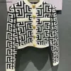 Panels de créateurs de mode Modèles géométriques Medusa Sweet Elegant Cardigan à manches longues simples Couleur de contraste Bouton Soft Knitted Pulls