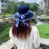 Breda randen hattar hink hattar vintage kvinnor stråhatt elegant blomma båge band sol hatt sommar resor solskydd bred brim hatt 24323