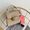 Loja atacado sacos de designer bolsa de ombro 2024 moda nova bolsa colorida simples e na moda padrão de litchi feminino clássico luz luxo crossbody