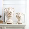 花瓶ヨーロッパの金メッキ象牙磁器の花瓶ヴィンテージ高度なセラミック花部屋の勉強廊下の家の結婚式の飾り