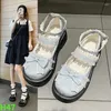 Chaussures décontractées japonais mignons filles en cuir 2024 étudiante à arc féminine semelle plate single haute qualité