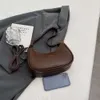 Borse tote di moda di lusso firmate Portafogli Borsa sottobraccio di lusso leggera di moda urbana francese borsa a mezzaluna con una spalla semplice e versatile