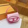 حقيبة الكتف عالية الجودة تحكم حصري البضائع يموت Dingdang حقيبة سرج جديد رفيعة المستوى Light Luxury Handbag حقيبة Crossbody صغيرة