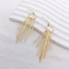 Boucles d'oreilles pendantes en métal pour femmes, déclaration coréenne, couleur or, longue chaîne, pompon, bijoux à la mode, vente en gros