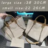 tote designer handbag high quality luxury shoulder bags designers woman crossbody Canvas material buckle design Two sizes included wallet trip vacation beach bags