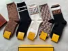 Men's and women's high-end brand socks letter P solid color cotton leisure socks soft knee-high socks suitable for horses.