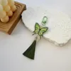 キーチェーン中国の蝶キーチェーンビンテージカラフルなタッセルキーリングペンダントバッグチャームハンドバッグ装飾