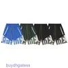 Shorts pour hommes Designer Marque Rhude Patchwork Lettre Imprimer Lâche Cordon Pill Zipper Basketball Sports Pantalons High Street Hommes et Femmes Capris Tendance