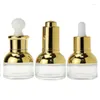 Lagringsflaskor 10st Glass Droper 30 ml Gold Essence Ampoule Distribuera Bottle Press Pipette Lock Kosmetiska påfyllningsbara eteriska oljeflaskor