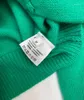 Maglieria da donna 2024 Cardigan in cashmere con doppio colletto a V profondo da donna dell'inizio della primavera