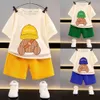 新しい服の子供用セット男の子のためのカジュアルなゆるい服半短袖のワッフルベイビー夏卸売