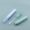 Bouteilles de stockage 50pcs Tube en plastique de forme ronde vide 4ml rechargeable Lipgloss cosmétique couvercle coloré conteneur emballage