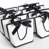 Present Wrap 5st/Set Portable White Bag Ribbon Bow Paper Packaging Påsar med handtag bröllopsblommor inpackning party gynnar