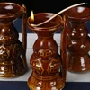 Dekorativa figurer Keramiska gammaldags ljusstake Antik oljelamphållare Hushållens offerförsörjning ber om lyckosamhet