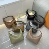 Umhängetaschen Neue gewebte Lunchbox-Tasche Mode Koreanische Ausgabe Licht Luxus Trend Echtes Leder Handheld One Unterarm für Frauen