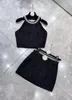 2024 Spring White/Black Women's Two Pieces Dress Designer Beading Pearls Neck Sleeveless Women Tops And Pearls Skirts Sets 3247