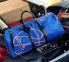 Bolsas de Duffel de esportes masculinos Bolsas de viagem Padrão de futebol Mulheres de grande capacidade Bolsa de viagem casual à prova d'água