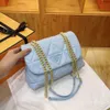 Les créateurs de sacs à bandoulière vendent des sacs unisexes de marques populaires Texture nouveau style de chaîne en cuir souple