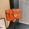 Designer Luxury fashion Shoulder bags New Fashion Trend Nail Diamond Small Square Bag 2023 Versatile Motorcycle Chain Bag Single Sidearm Womens Bag