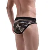 アンダーパンツの男性ブリーフカモフラージ印刷された下着Cueca Masculina Penis Pouch Male Slip Pantiesローウエストビキニナイトウェアスリープウェア