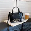 Torba wiadra Top Designer Fashion Proste zaawansowane uczucie Nowe modne torebki stylowe i wszechstronne wiadra crossbody popularna torba na ramię