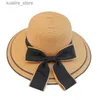 Szerokie brzegi czapki wiadra czapki słoneczne wielkie czarne łuk letnie czapki dla kobiet składane słomki plażowe panama kapelusz wizor szerokie grzbiet femme żeński 2018 Nowy L240322
