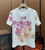 デザイナーTシャツの女性半袖のネクタイの輝くラインストーン女性Tシャツトップティーアンダーシャツ