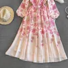 Lässige Kleider Runway Fashion Frühling Urlaub Blumen Langes Kleid Elegante Frauen Schnüren O-Ausschnitt Blumendruck Chiffon Rosa Puffärmel Party Robe