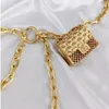 Ceinture de chaîne de luxe pour femmes, Mini taille, sac en métal doré, ceinture ajourée, pompon, accessoires de bijoux de corps 240308