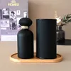 Flacon de parfum en verre vide rond noir mat Unique de luxe de haute qualité avec boîte d'emballage