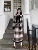 Tweedelige jurk Vintage geruite vlinderknoop Lange mouwen Wollen bovenkleding Halve rok set voor dames in herfst-winter 2024 Modieus