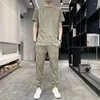 مسارات الرجال أعلى الركض Tirt Man Man Jogger Clothing Pants Pants مجموعات مقاطعات مقسمات ناعمة بدلات رياضية قصيرة ربع الأكمام غير الرسمية