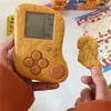 McNuggets Console de jeu Poulet frit McDonalds Jouets périphériques Tetris Console de poche Collection Mini Machine cadeau pour enfants 240319
