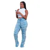Jeans da donna con frange pantaloni in denim da donna cerniera in difficoltà tinta unita 2024 pantaloni sexy strappati con nappa moda primavera streetwear