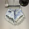 Kvinnors jeans 2024 Sommarmode låg midja denim shorts kvinnor tofs korta byxor tvättade blå bottnar kvinna