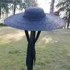 Szerokie brzegowe czapki wiadra Czapki czarne szerokie brązowa płaska górna wstążka słomka kapelusz wiosłowy łódź plażowa kapelusz z podbródkiem i na świeżym powietrzu kapelusz słoneczny l240322
