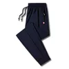 Ice Silk Quick Torking Pants Thin Summer Mens Casual Sports Running Long Ben Large Size Anti Wear Hållbar och smal bär