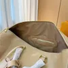 24ss unisex lüks tasarımcı çanta seyahat çantası çiğ deri kalın aşınmaya dayanıklı dayanıklı ham donanım büyük kapasiteli kadın el çantası