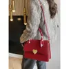 Sacs à bandoulière de mode de luxe de concepteur 2024 Nouveau mariage pour femmes Petit sac carré Sac à main simple et de luxe Sac à bandoulière unique pour femmes