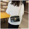 النسخة الكورية من سلسلة العطور الصغيرة مربعة مربعة تنوع حقيبة جديدة للأزياء الشهيرة Crossbody Women's Handbag