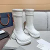 Mulheres homens botas de botas chuva borracha de inverno plataforma tornozelo tornozelo slip-o meio rosa preto verde focalista da marca de luxo ao ar livre 35-45