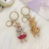 Nyckelringar Full Crystal Rhinestone kjol Keychain Car Keyrings Women's Bags Decoration Accessories Long Ear Pendants smycken