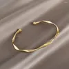 Bracciale intrecciato lucido color oro con apertura alla moda 2024 per gioielli da donna con polsino con ciondolo in stile minimalista femminile