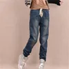 Ankomst vinter varma jeans kvinnor förtjockar fleece mager harem byxor byxor elastiska midja denim byxor plus storlek byxor c1504 240320