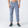 Lu Sports Pants Herren Cool Feeling Dry Pants Lose und gewebte elastische Plattfuß-Fitness- und Freizeithosen