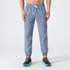 Lu Pantaloni sportivi da uomo Pantaloni asciutti Cool Feeling Pantaloni larghi e intrecciati per fitness e tempo libero con piede piatto elastico