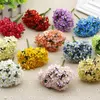 Kwiaty dekoracyjne 1,5 cm Mini Silk Babybreath Flower Bukiet sztuczny materiał Kwiat wiśniowy do Wewnień Dekoracja scrapbookingu