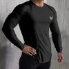 長袖Tシャツの男性ソリッドカラーコットンTシャツボディービルアンダーウェアシャツスプリングジョガースポーツマッスルエクササイズ3XL 240315