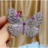 Broches broches SUYU complet zircon cubique creux papillon broche élégant corindon rouge rétro manteau boucle ardillon L240323