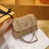 Les créateurs de sacs à bandoulière vendent des sacs unisexes de marques populaires Texture nouveau style de chaîne en cuir souple